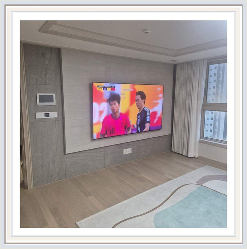 벽걸이TV 설치 참고 사진: 가격·비용·견적 세 표현이 가리키는 범위에 대해 점검할 시공 장면 (실제 해당 지역 후기 아님)