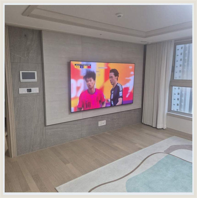 벽걸이TV 설치 참고 사진: 업체 선택에서 후기보다 먼저 물어볼 질문에 대해 점검할 시공 장면 (실제 해당 지역 후기 아님)